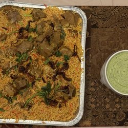 Taste of Bombay Indian Restaurant - Lamb biryani and green chutney / sauce
