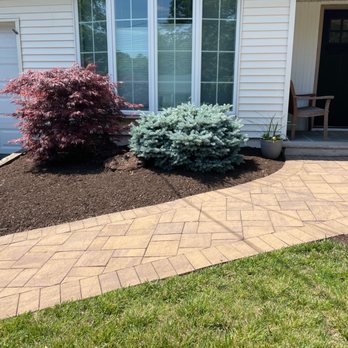 White Birch Landscape Design - a brick walkway in front of a house - Tree Services Near Me White Birch Landscape Design - a brick walkway in front of a house - Tree Services Near Me