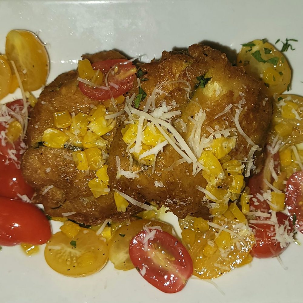Giovanni's Brooklyn Eats - Fried Zucchini Fritters stuffed w/ Prosciutto & Burrata Mozzarella Cheese w tomatoes - Italian Near Me - Brooklyn, New York