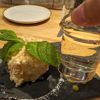 Bevri - Mini Napoleon Cake. Water glass for scale. - Georgian Near Me - Los Altos, California Bevri - Mini Napoleon Cake. Water glass for scale. - Georgian Near Me - Los Altos, California