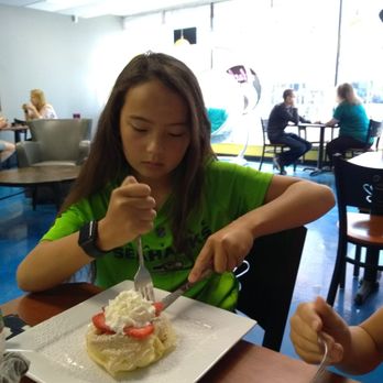 Alaska Crepery - Elyse and her strawberries and whipped creme crepe - Creperies Near Me - Anchorage, Alaska