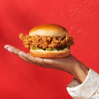 A&W Restaurant - a hand holding a chicken sandwich - Burgers Near Me - Centralia, Washington A&W Restaurant - a hand holding a chicken sandwich - Burgers Near Me - Centralia, Washington
