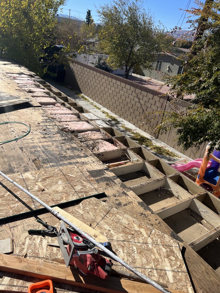 Slide of Ortiz Roofing