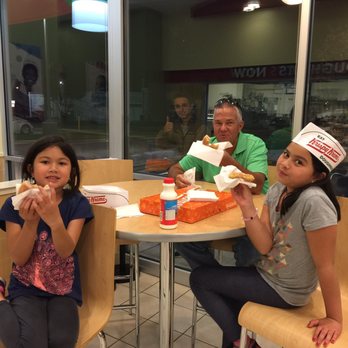 Krispy Kreme - We got photo bombed but didn't stop them having fresh donuts hot and fresh - Donuts Near Me - Greensboro, North Carolina