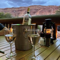 Bottle of wine on the patio with a great view.