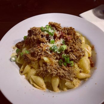Mad Pecker Brewing - Bacon Mac n cheese. With pulled pork. It's stupid good! - New American Near Me - San Antonio, Texas Mad Pecker Brewing - Bacon Mac n cheese. With pulled pork. It's stupid good! - New American Near Me - San Antonio, Texas
