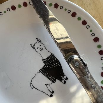 Llama Restaurant - Cute lil llama plate & laguiole knife - Peruvian Near Me - Saint Augustine, Florida