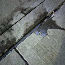 My Taro Bubble Tea dripping away on the sidewalk My Taro Bubble Tea dripping away on the sidewalk