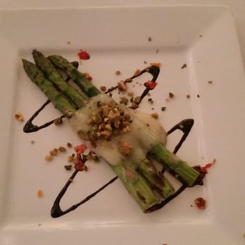 L'etoile Restaurant - Grilled Spring Asparagus wrapped in Prosciutto with Truffle Cheese on Silky Parsnip Puree with Pistachio Gremolata - French Near Me - Edgartown, Massachusetts L'etoile Restaurant - Grilled Spring Asparagus wrapped in Prosciutto with Truffle Cheese on Silky Parsnip Puree with Pistachio Gremolata - French Near Me - Edgartown, Massachusetts
