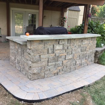 Red Falls Landscape Designs - Grill bar, patio out of pavers and flag stone. For more information visit us at https://redfallslandscape.com/ - Landscaping Near Me Red Falls Landscape Designs - Grill bar, patio out of pavers and flag stone. For more information visit us at https://redfallslandscape.com/ - Landscaping Near Me