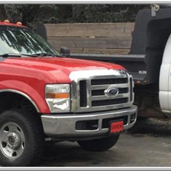 Newhouse Contracting - two trucks parked in a lot - General Contractors Near Me - Aliquippa, Pennsylvania