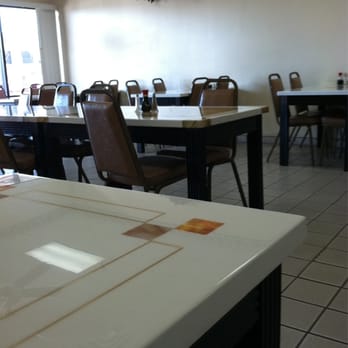 Wokee Express - tables and chairs in a restaurant - Chinese Near Me - Gilbert, Arizona Wokee Express - tables and chairs in a restaurant - Chinese Near Me - Gilbert, Arizona