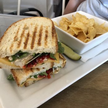 Shoredog Cafe - Westham sandwich with side of pickle and chips - Cafes Near Me - Richmond, Virginia