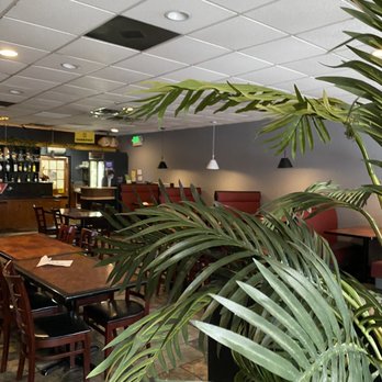 Pho Dat Thanh - a restaurant with tables and chairs - Vietnamese Near Me - Towson, Maryland