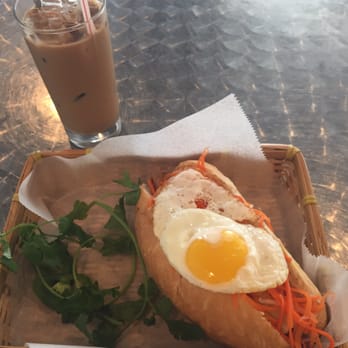 Ba Mien Bistro - Iced coffee & Grilled pork sandwich with fried egg - Vietnamese Near Me - Houston, Texas Ba Mien Bistro - Iced coffee & Grilled pork sandwich with fried egg - Vietnamese Near Me - Houston, Texas
