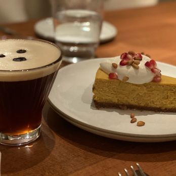 Flea Street - Espresso Martini and pumpkin cheesecake with pomegranate. - New American Near Me - Menlo Park, California