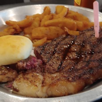 Simmer Down - Ribeye steak, onion petals - New American Near Me - Baldwyn, Mississippi