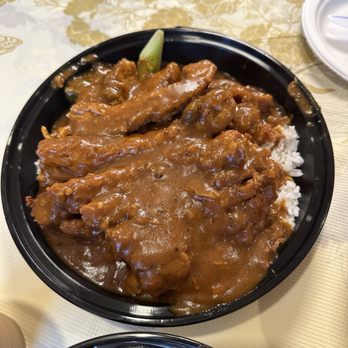 Marathon Cafe - Fried Pork Chop With Pepper Onion Sauce Over Rice - Chicken Wings Near Me - Little Neck, New York Marathon Cafe - Fried Pork Chop With Pepper Onion Sauce Over Rice - Chicken Wings Near Me - Little Neck, New York