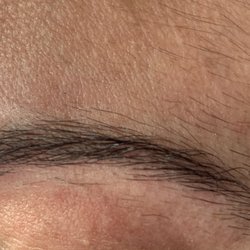 Impressions Salon & Spa - Full eye brow waxing