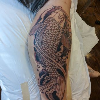 Breakwater Tattoo - Koi line work and sharing came out so good and Justin was super fast - Tattoo Near Me - Long Beach, California