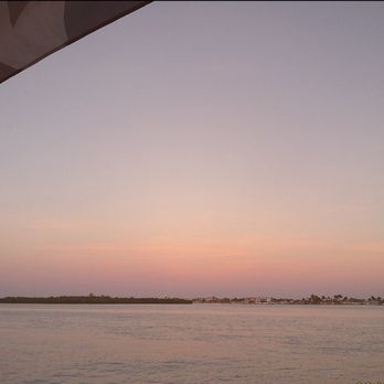 Sculley's - The view from where we sat on the lower, outside deck. Coconut Shrimp Dinner was great! - Seafood Near Me - Madeira Beach, Florida Sculley's - The view from where we sat on the lower, outside deck. Coconut Shrimp Dinner was great! - Seafood Near Me - Madeira Beach, Florida