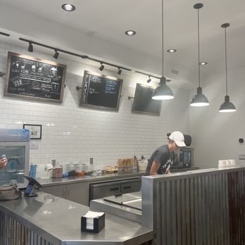 Frozen Five Ice Creamery - a man working behind the counter - Ice Cream & Frozen Yogurt Near Me - Waconia, Minnesota Frozen Five Ice Creamery - a man working behind the counter - Ice Cream & Frozen Yogurt Near Me - Waconia, Minnesota