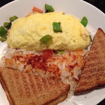 Ricky's All Day Grill - an omelet and toast - Canadian (New) Near Me - Calgary, Alberta Ricky's All Day Grill - an omelet and toast - Canadian (New) Near Me - Calgary, Alberta