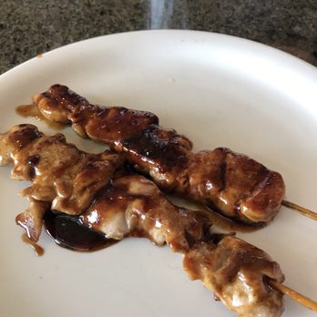 Liliha Bakery - Teri chicken sticks. Rubbery and completely tasteless except for the bottled sauce poured on top. - Bakeries Near Me - Honolulu, Hawaii
