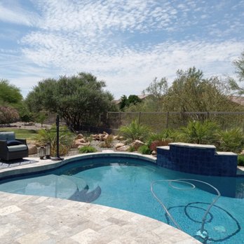 Sonoran Landscape Design - Pool remodel with new water feature, waterline tile and coping to match the travertine patio - Landscaping Near Me - Mesa, Arizona Sonoran Landscape Design - Pool remodel with new water feature, waterline tile and coping to match the travertine patio - Landscaping Near Me - Mesa, Arizona