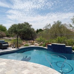 Sonoran Landscape Design - Pool remodel with new water feature, waterline tile and coping to match the travertine patio