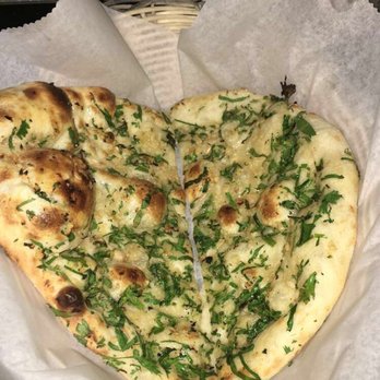 Bombay Darbar - GARLIC NAAN - Naan topped with cilantro and garlic. - Indian Near Me - Miami, Florida Bombay Darbar - GARLIC NAAN - Naan topped with cilantro and garlic. - Indian Near Me - Miami, Florida