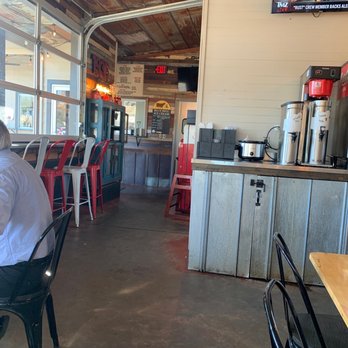 Son's Smokehouse - a man sitting at a table - Smokehouse Near Me - Jasper, Alabama Son's Smokehouse - a man sitting at a table - Smokehouse Near Me - Jasper, Alabama