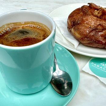 49th Parallel Coffee - Americano and a maple bacon donut - Coffee & Tea Near Me - Vancouver, British Columbia 49th Parallel Coffee - Americano and a maple bacon donut - Coffee & Tea Near Me - Vancouver, British Columbia