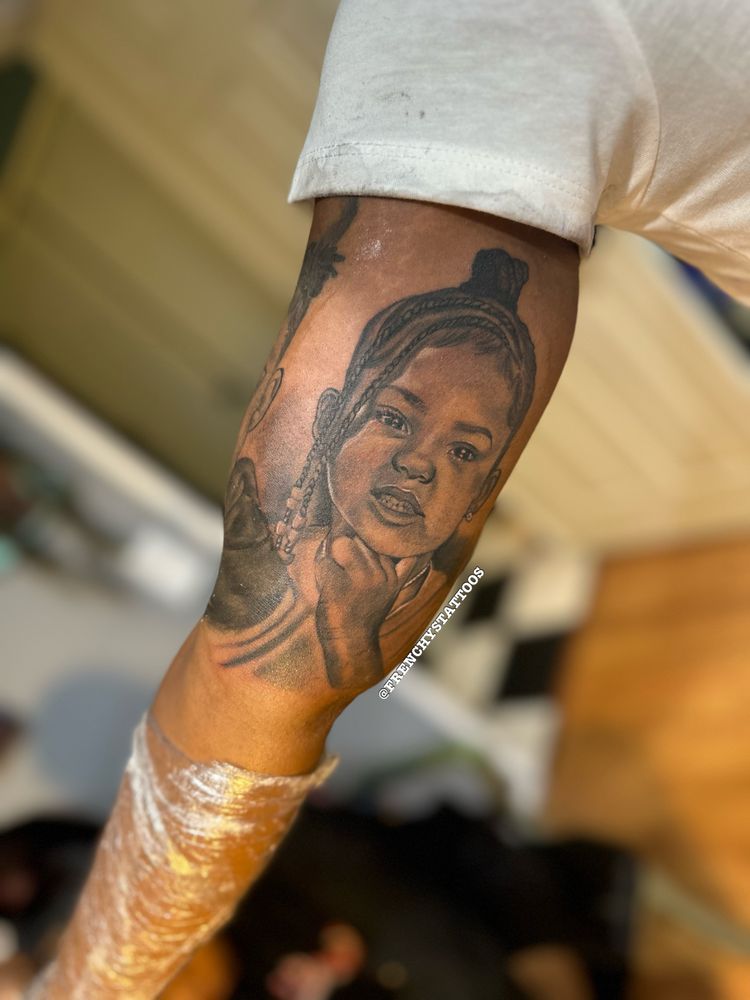 Frenchy's Tattoos Logo