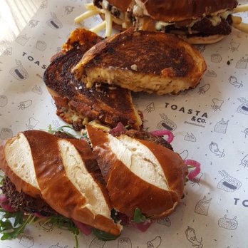 Toasta & Co - Crispy eggplant Parma, Mac and cheese toastie with caramelised onion, poutine chicken Parma with gravy and chips - Sandwiches Near Me - West Melbourne, VIC
