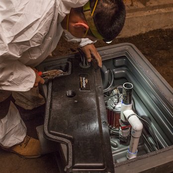 Crawl Pros - Preparing sump pump for installation - Insulation Installation Near Me - Portland, Oregon