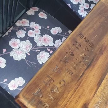 Nakama Anime Bar - Tables all have their named branded into them..it's all in those details... - Karaoke Near Me - Orange Park, Florida