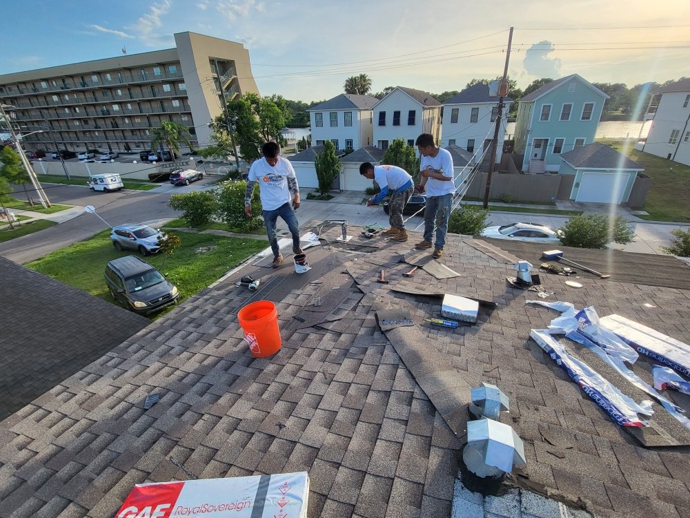 Slide of Anything & Everything Roofing