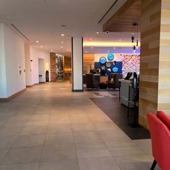 Hyatt Place Boston / Seaport District - Lobby and front desk check in (2nd floor). - Hotels Near Me - Boston, Massachusetts Hyatt Place Boston / Seaport District - Lobby and front desk check in (2nd floor). - Hotels Near Me - Boston, Massachusetts