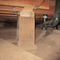 Aspen Home Inspections - Crawlspace conditions. Improper added supports identified.