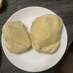 Raw, gooey, undercooked rolls in our to-go order. Raw, gooey, undercooked rolls in our to-go order.
