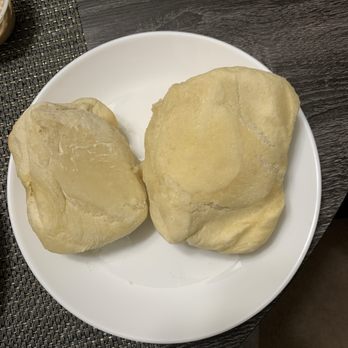 Texas Roadhouse - Raw, gooey, undercooked rolls in our to-go order. - Steakhouses Near Me - Kentwood, Michigan