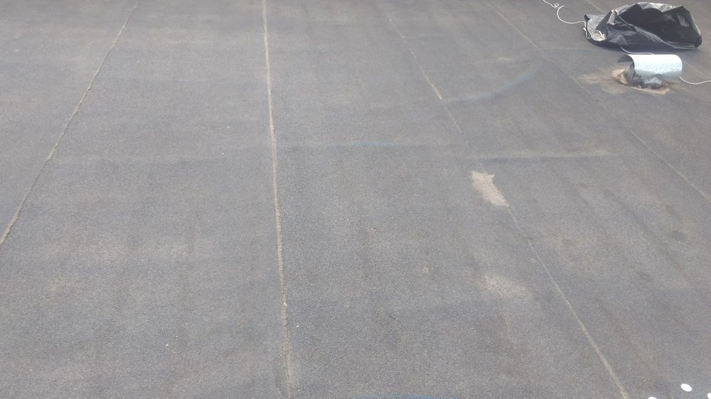 Slide of Benitez Roofing & Waterproofing