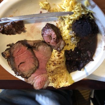 Beef Grill - So, not the best picture. But it shows how the meat isn't all cooked to the point where it's dry. It's good meat! - Brazilian Near Me - Sandy Springs, Georgia