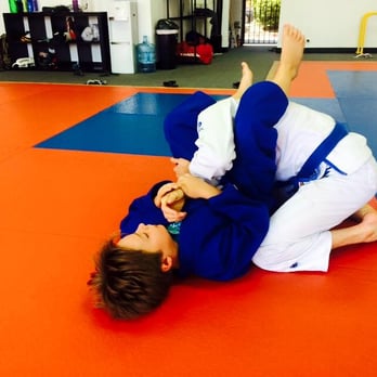 Serao Academy - 9 year old drilling armbar from guard - Martial Arts Near Me - Mountain View, California Serao Academy - 9 year old drilling armbar from guard - Martial Arts Near Me - Mountain View, California