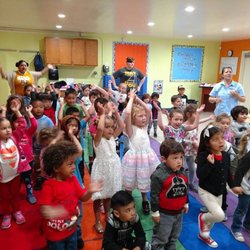 Hearts and Hands Christian Childcare & Preschool - Praise and Worship time as a school. The children love to sing and dance