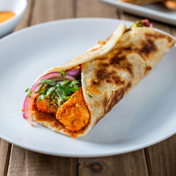 Bombay Eats - Cheese Paneer Wrap in a flaky paratha with cilantro mint chutney & pickled onions. - Indian Near Me - Chicago, Illinois Bombay Eats - Cheese Paneer Wrap in a flaky paratha with cilantro mint chutney & pickled onions. - Indian Near Me - Chicago, Illinois