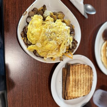 Heidi's Family Restaurant - Meat and cheese skillet with scrambled eggs. - Breakfast & Brunch Near Me - Anchorage, Alaska