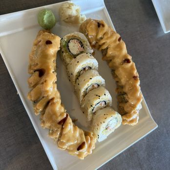 Wild Ginger on 116th Street - Crab Rangoon Roll & Tiger Roll (Middle) - Sushi Bars Near Me - Fishers, Indiana Wild Ginger on 116th Street - Crab Rangoon Roll & Tiger Roll (Middle) - Sushi Bars Near Me - Fishers, Indiana