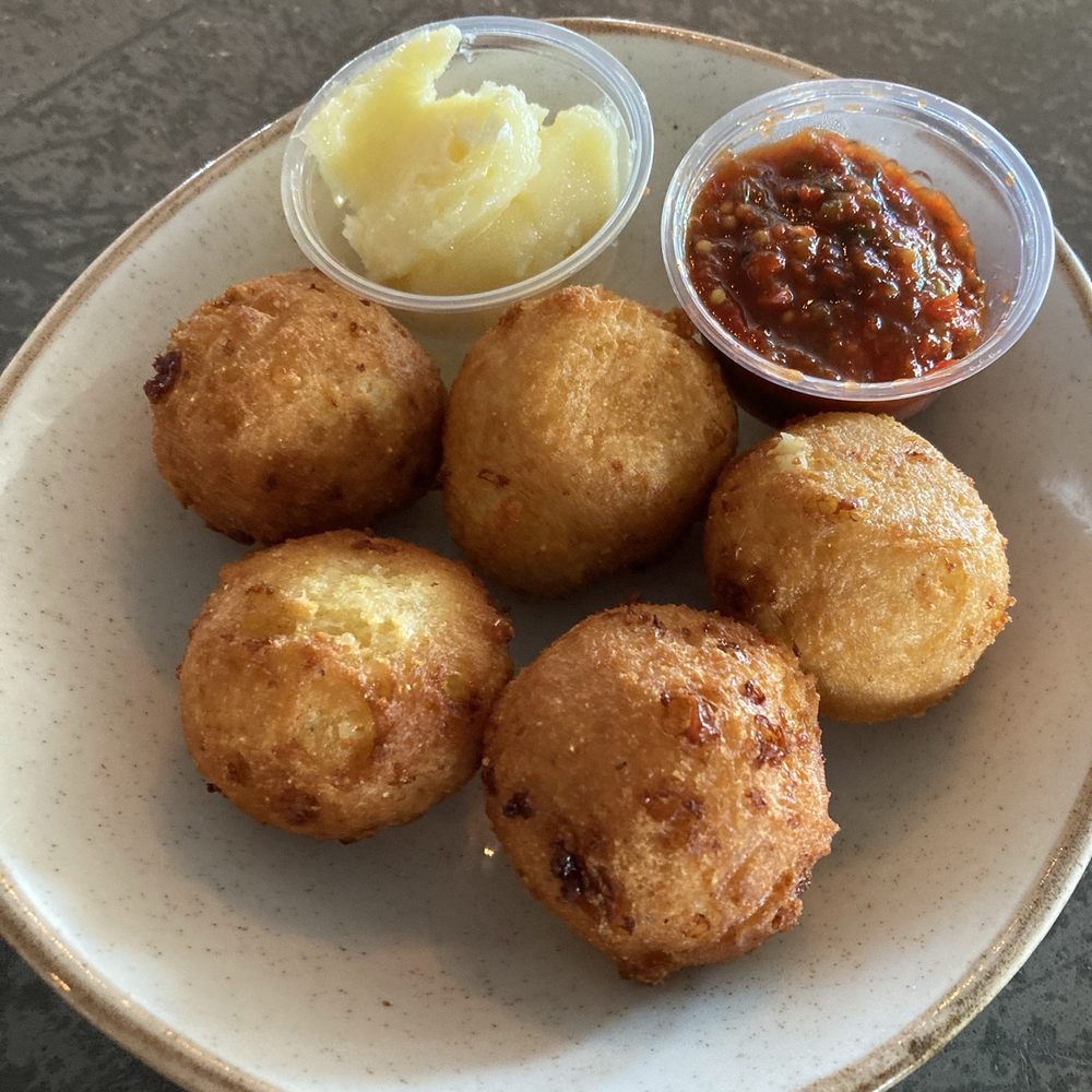 The Village Table & Tavern - Goat Cheese & Feta Hushpuppies - New American Near Me - Duck, North Carolina